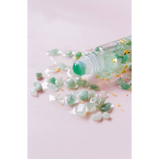 Summer Salt Body Essential Oil Roller applied to the neck