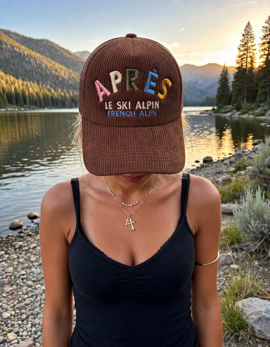 Après Le Ski Alpin Corduroy Trucker Hat - Brown on the hat model at Payette Lake