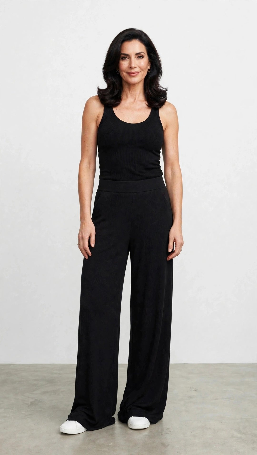 Petite model wearing the Shea Soft Hot Spell Pant in Black